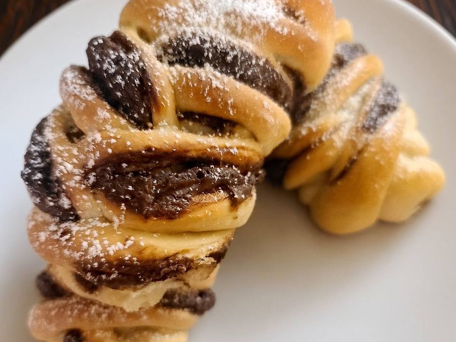 Chocolate katmer dusted with powdered sugar
